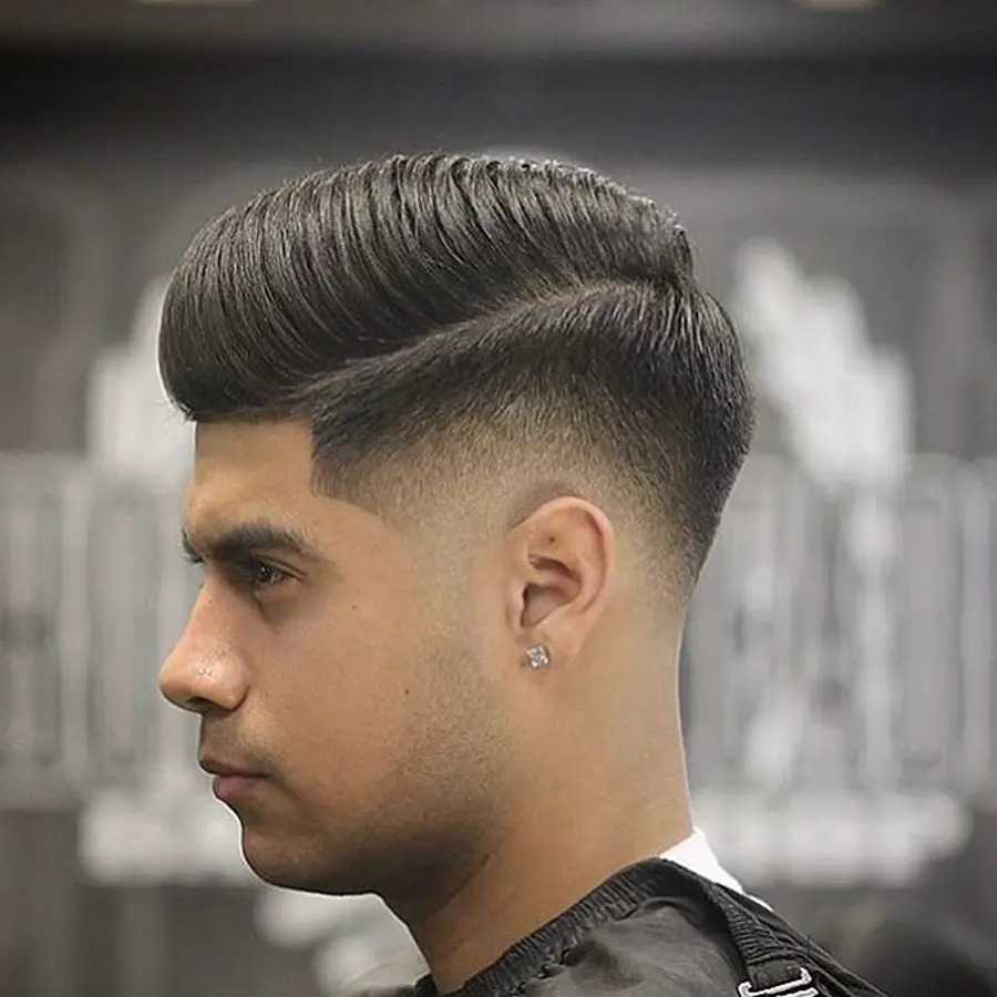 Clean fade finished with a straight razor